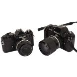 Black Nikon FE & F-301 SLR Cameras