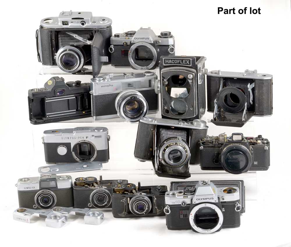 Large Quantity of Olympus Spare Parts, Plus Cameras for Spares.