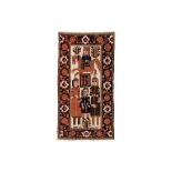 AN UNUSUAL ANTIQUE PICTORIAL BALOUCH RUG, NORTH-EAST PERSIA