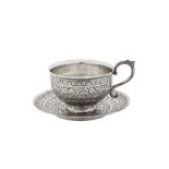 A LATE 19TH CENTURY ANGLO-INDIAN UNMARKED SILVER TEA CUP AND SAUCER Kashmir, circa 1890
