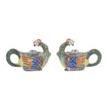 A PAIR OF FAIENCE TEAPOTS ATER THE MODEL BY J.J. KANDLER