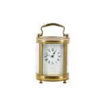 AN EARLY 20TH CENTURY FRENCH BRASS CARRIAGE CLOCK