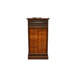 AN EARLY 20TH CENTURY TAMBOUR FRONTED OAK HABERDASHERY CABINET