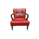 A RED LEATHER ARMCHAIR