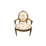 A LOUIS XVI STYLE GILTWOOD FAUTEUIL ARMCHAIR