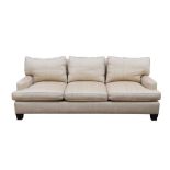 BAKER, USA; A THREE SEATER SOFA