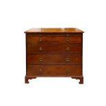 A REPRODUCTION MAHOGANY CHEST OF DRAWERS