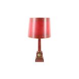 A REGENCY STYLE RED TOLEWARE TABLE LAMP, EARLY 20TH CENTURY