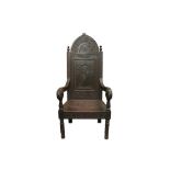 A 19TH CENTURY CARVED OAK THRONE CHAIR