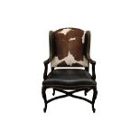 A RALPH LAUREN LEATHER AND COW HIDE UPHOLSTERED WING BACK ARMCHAIR