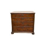 AN EARLY 18TH CENTURY STRUNG WALNUT CHEST OF FOUR LONG GRADUATED DRAWERS