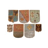 A GROUP OF SEVEN HERALDIC SHIELDS