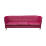 A CONTEMPORARY DESIGNERS GUILD THREE SEATER SOFA