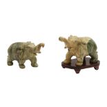 A PAIR OF CHINESE HARDSTONE 'ELEPHANT' CARVINGS, 20TH CENTURY