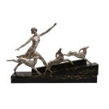 A SILVERED BRONZE FIGURAL GROUP CAST FROM A MODEL BY G. DAVERNY