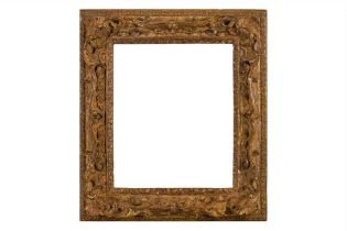 AN ENGLISH 18TH TH CENTURY CARVED, PIERCED, SWEPT AND GILDED FRAME