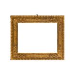 A NORTHERN ITALIAN 17TH CENTURY CARVED AND GILDED CASSETTA FRAME