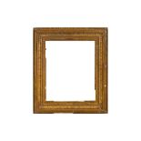 A FRENCH 19TH CENTURY GILDED COMPOSITION EMPIRE FRAME