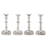 A set of four George II sterling silver candlesticks, London 1750 by William Gould