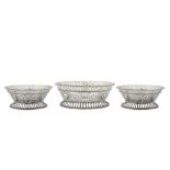 A suite of three George V sterling silver replica baskets, London 1926 by Carrington and Co