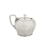 A Victorian sterling silver mustard pot, London 1852 by Joseph Angell II