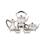 A George V sterling silver five-piece tea and coffee service, Sheffield 1909-12 by Cooper Brothers a