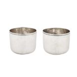 A pair of George III sterling silver tumblers, London 1765 by Charles Hougham
