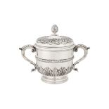 An Edwardian sterling silver covered twin handled porringer, London 1905 by Goldsmiths and Silversmi