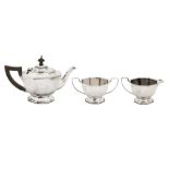 An early 20th century sterling silver three-piece tea service, import marks for Sheffield 1909