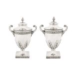 A pair of George V sterling silver condiment vases, London 1913 by Charles Stuart Harris