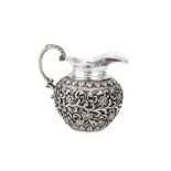 A late 19th century Anglo – Indian silver cream jug, Cutch, Bhuj by Oomersi Mawji Jnr, import marks