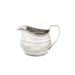 A George III Irish provincial silver milk jug, Cork circa 1790 by Samuel Green