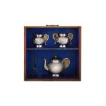A cased late 19th / early 20th century Chinese export silver three-piece tea service, Shanghai circa