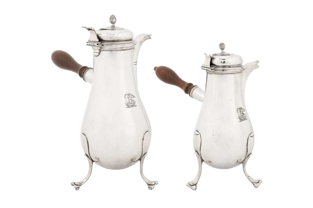 A graduated pair of late 18th century French provincial silver chocolate pots, Strasbourg circa 1785