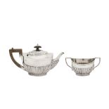 An Edwardian sterling silver teapot and sugar bowl, Chester 1906 by Barker Brothers