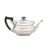 A George V sterling silver teapot, London 1912 by Walter and Charles Sissons