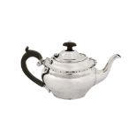An Edwardian sterling silver bachelor teapot, Birmingham 1907 by Mappin and Webb