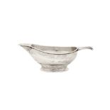 An Edwardian ‘Art and Crafts’ sterling silver cream jug, London 1905 by Nelson Dawson (Artificers Gu