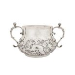 A large Charles II sterling silver twin handled porringer, London 1662 possibly by John Burges (free