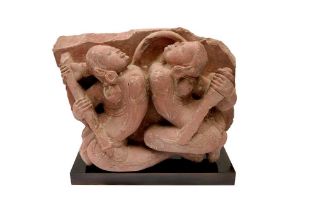 A CARVED RED SANDSTONE FIGURE OF FEMALE WARRIORS Madhya Pradesh, Chandela period, 12th - 13th centur