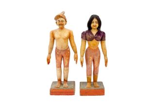 A PAIR OF HARDWOOD POLYCHROME-PAINTED LACQUERED SOUTHERN INDIAN MARAPACHI DOLLS (MARAPACHI BOMMAIS)