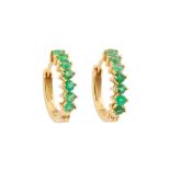 A PAIR OF EMERALD HALF HOOP EARRINGS