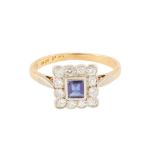 A SAPPHIRE AND DIAMOND SQUARE CLUSTER RING