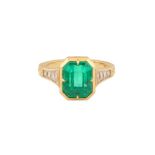 AN EMERALD AND DIAMOND RING