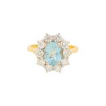 AN AQUAMARINE AND DIAMOND CLUSTER RING