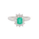 AN EMERALD AND DIAMOND RING