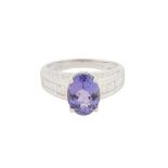 A TANZANITE AND DIAMOND RING