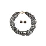 AN HEMATITE NECKLACE AND EARRING SUITE BY TIFFANY