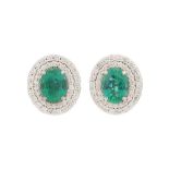 A PAIR OF EMERALD AND DIAMOND EARRINGS