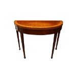 A GEORGE III SHERATON STYLE MAHOGANY AND CROSSBANDED DEMI LUNE CARD TABLE